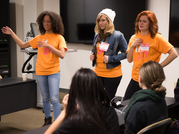 Rosaly and other iSchool students leads a session at the It Girls Overnight Retreat in 2014.