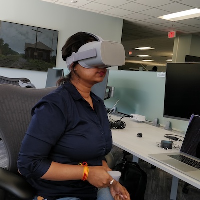 Poorvi tries out at Oculus VR headset for her innovation challenge.