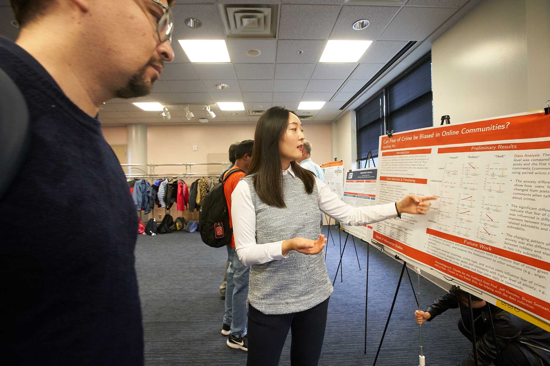 Qunfang Wu showcases her poster