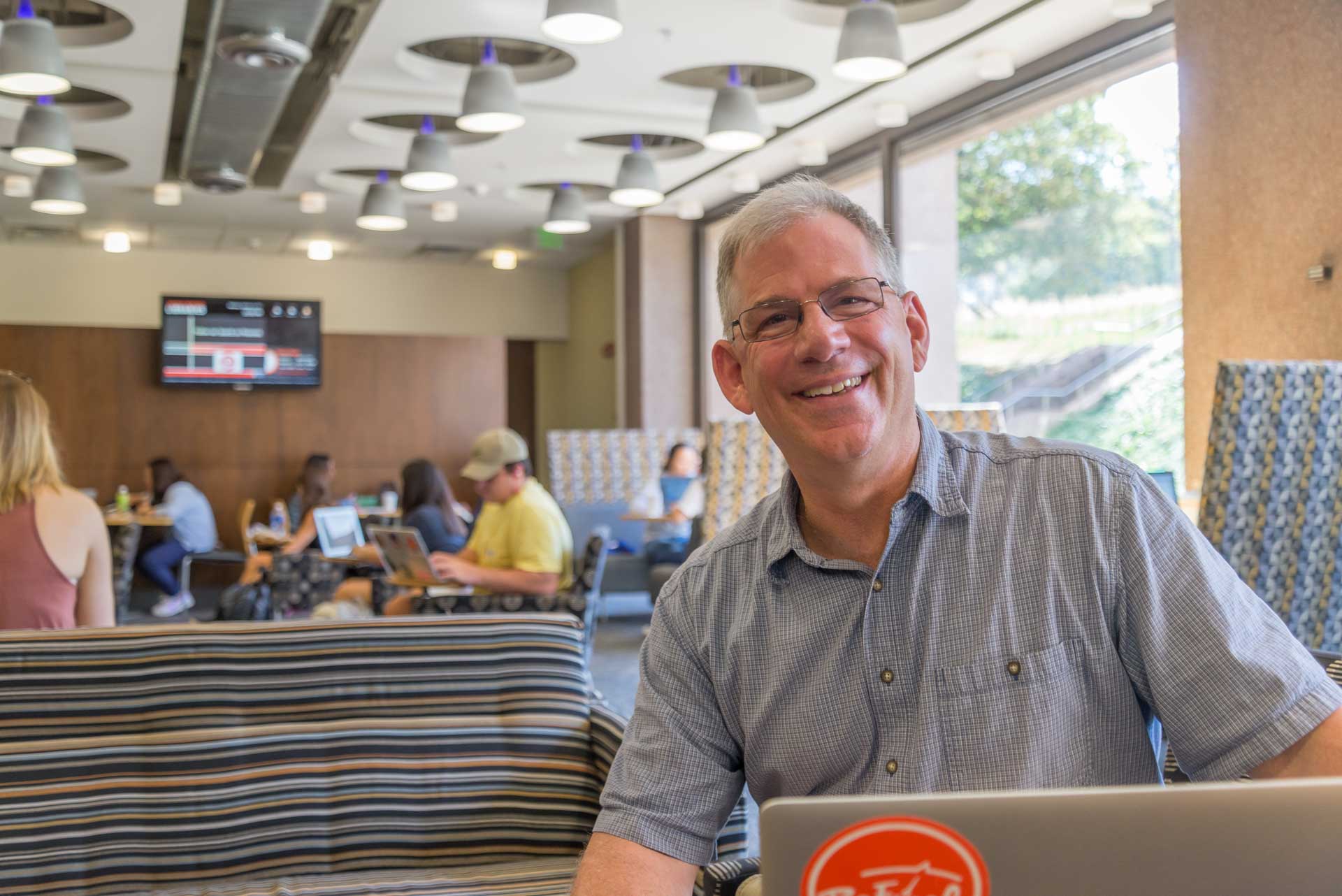 iSchool faculty member Steve Sawyer in Bird Library's Pages Cafe.