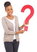 cheerful african woman holding question mark isolated on white