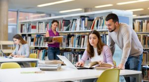 male librarian with student