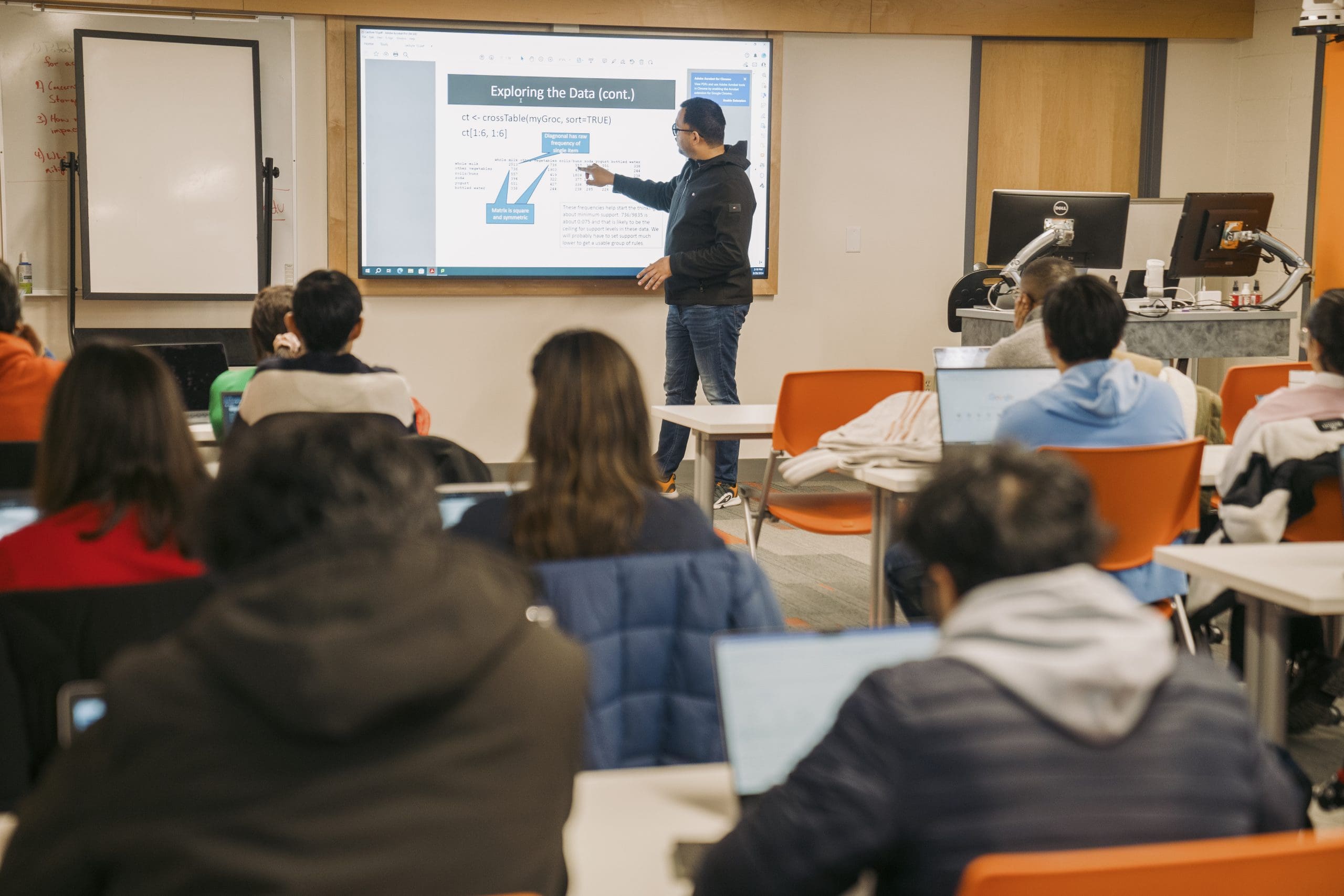 man presenting in class